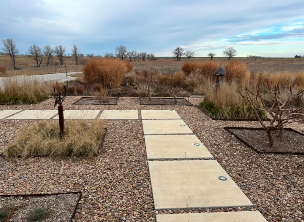 View of hardscaping with meadow in the background, winter